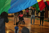 The group all got together for some parachute play